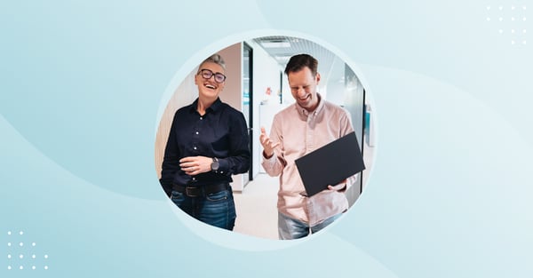 Photo of two people in office