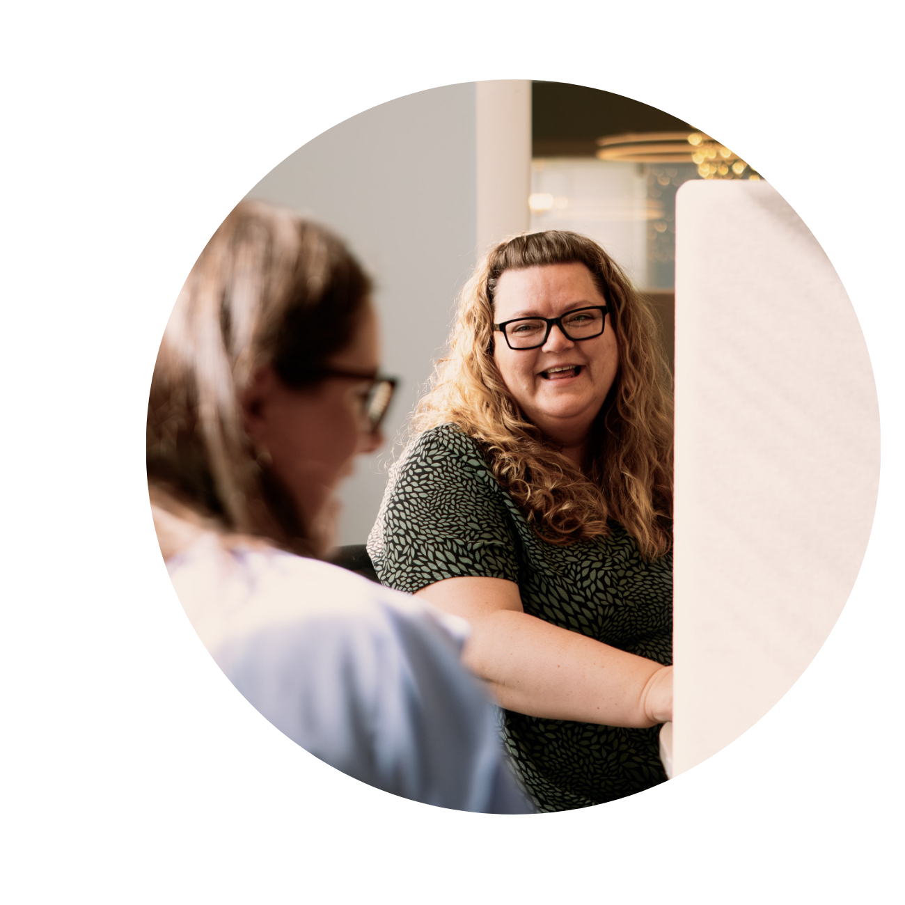 Three colleagues having a chat in the sofa