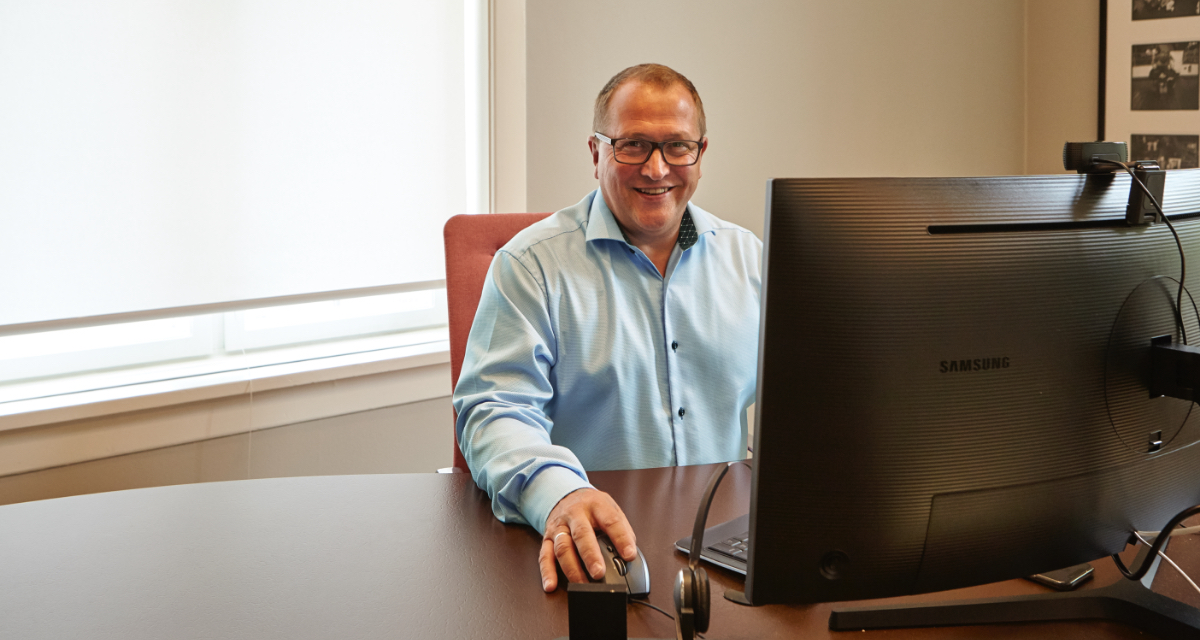 Man sitting in his office working